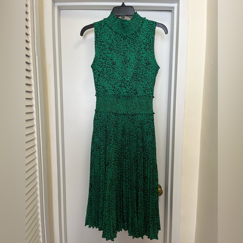 Nanette Lepore black and green leopard print, accordion style cocktail dress